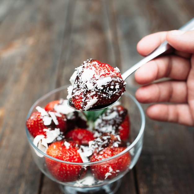 Strawberry chocolate dessert eating