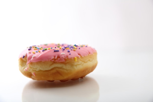 Strawberry chocolate donut isolated in white background