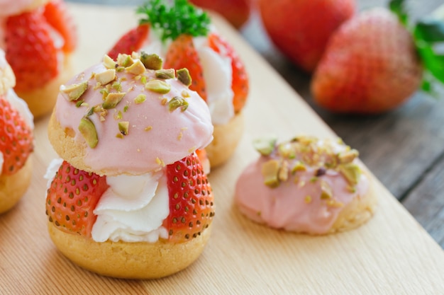 Strawberry choux cream. Combination with choux pastry whipped cream fresh strawberries.