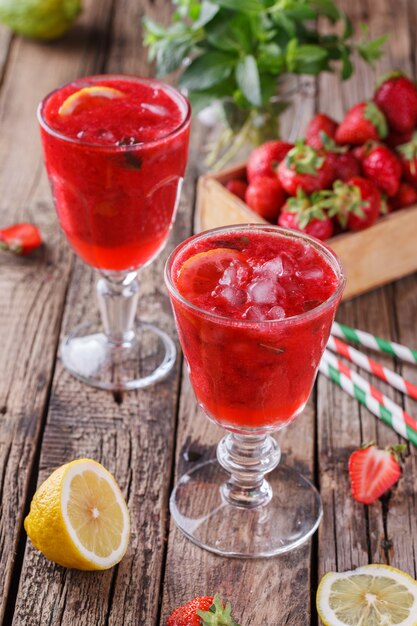 Strawberry, cold juice from fresh berries. Summer party drink