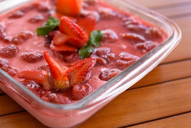 Strawberry cream dessert on the table. Brazilian gastronomy.