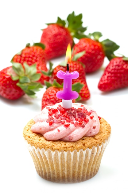 Photo strawberry cupcake with candle