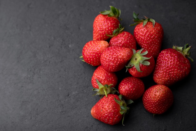 Strawberry on a dark