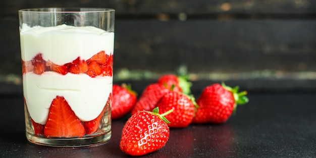 Strawberry dessert with yogurt in a glass