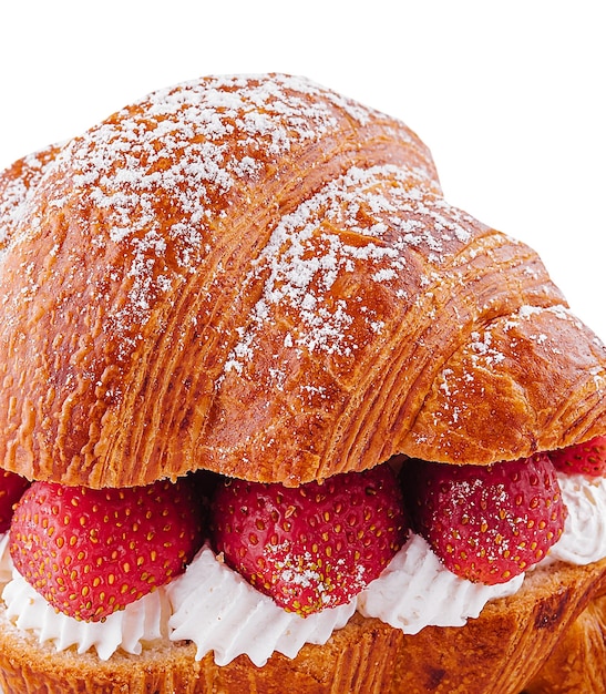 Strawberry and fresh cream croissant close up