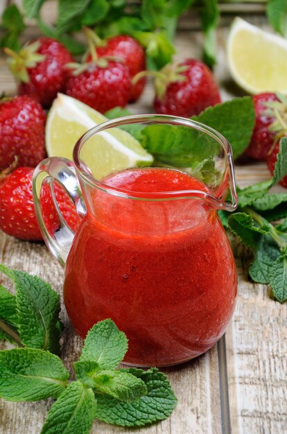 Strawberry fresh sauce with mint and lime Vertical shot