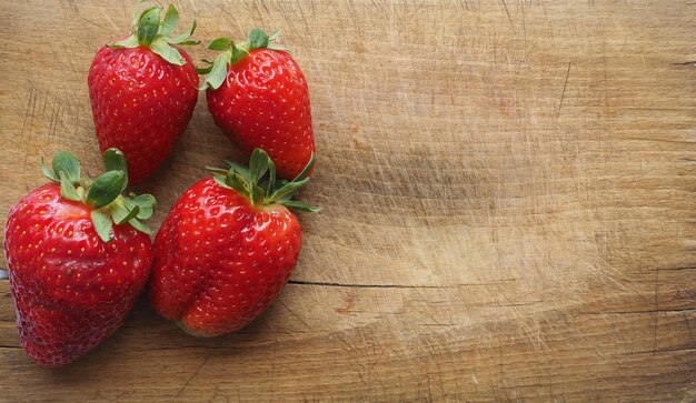 Strawberry fruit food on chopping board