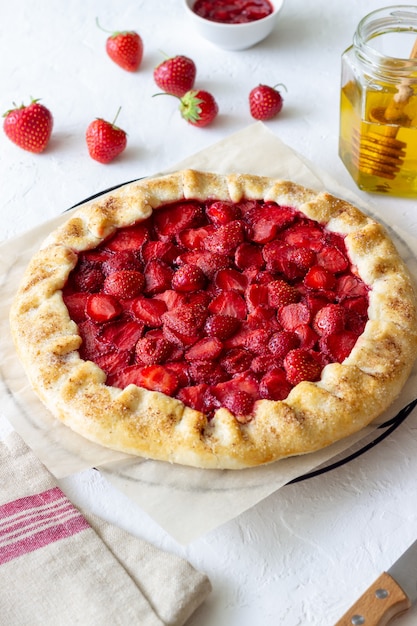 Strawberry galette or open pie . Baking. Vegetarian food.