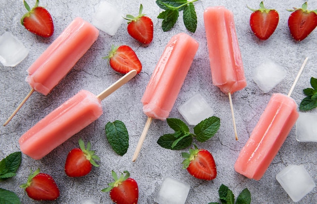 Strawberry ice cream popsicles