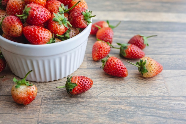 Strawberry is a sweet fruit on bowl