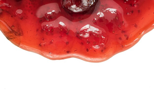 Strawberry jam on white background