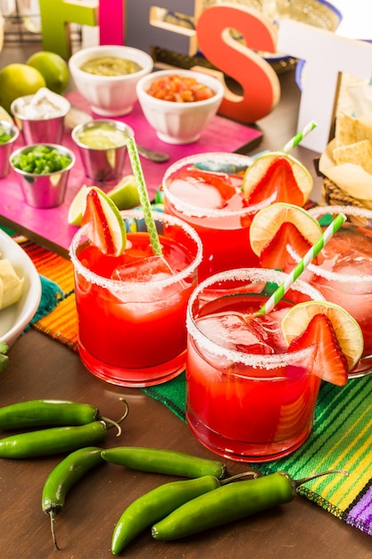 Strawberry and lime margaritas on the party table.