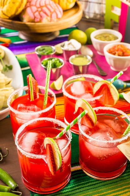 Strawberry and lime margaritas on the party table.