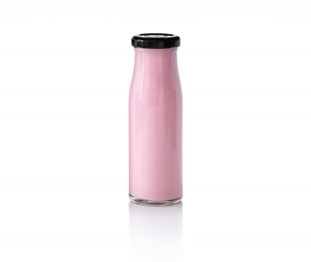 Photo strawberry milk bottle on isolated white