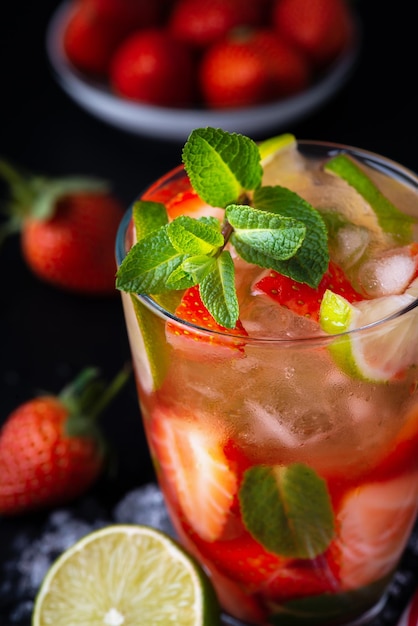 Strawberry mojito Refreshing summer drink with berries lime and mint
