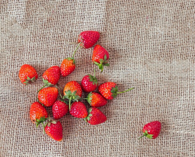 Strawberry on old wooden surface