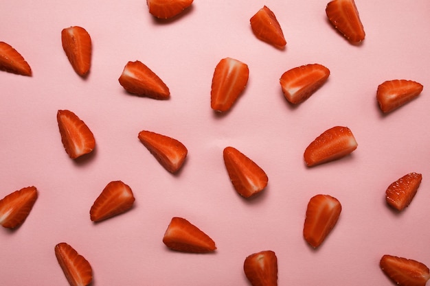 Strawberry pattern on pastel pink surface. summer concept. flat lay, top view, square