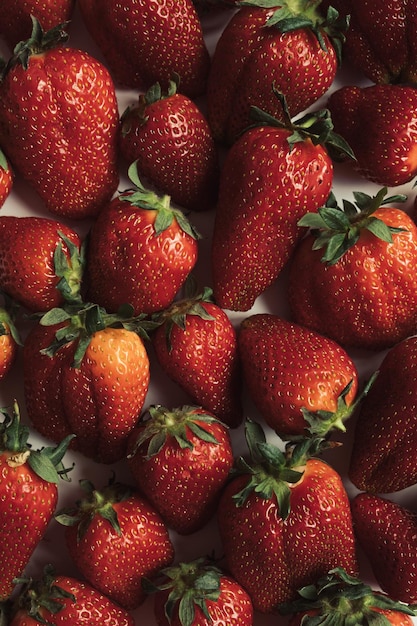 Strawberry Pattern of strawberries on white background Top view