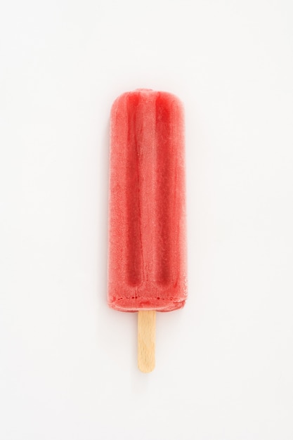 Strawberry popsicle on white