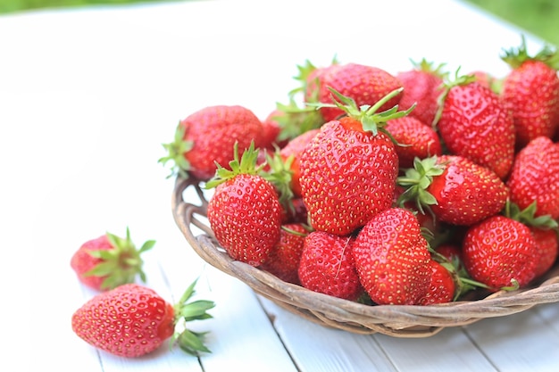 Strawberry on rustic wooden background