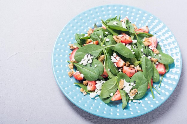 Strawberry salad with spinach cheese and walnut Healthy food