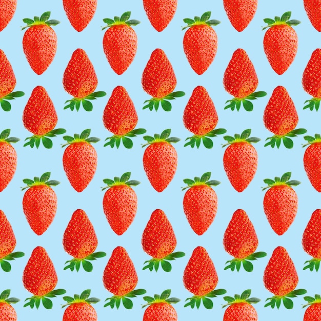 Photo strawberry seamless pattern ripe strawberries isolated on blue package design background