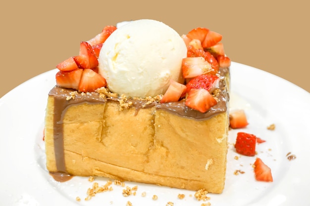 Strawberry slice and vanilla ice cream with chocolate toast