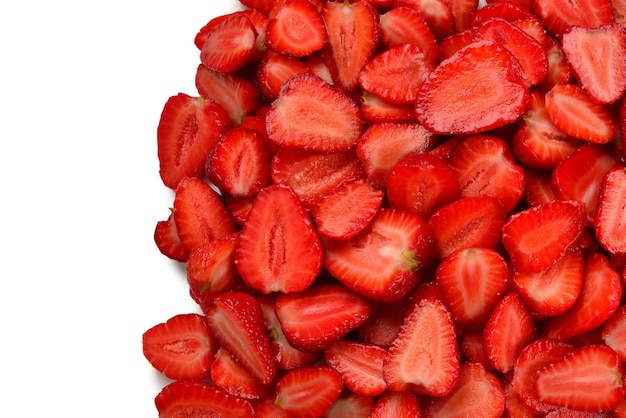 Strawberry slices. Fresh berries macro. Fruit background. Top view.