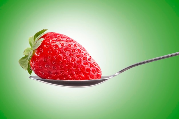 Photo strawberry and spoon