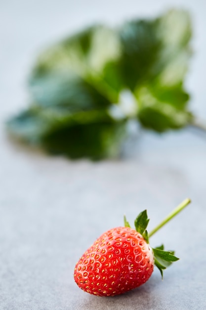 strawberry with leaves on the table