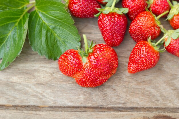 Strawberry on wood background