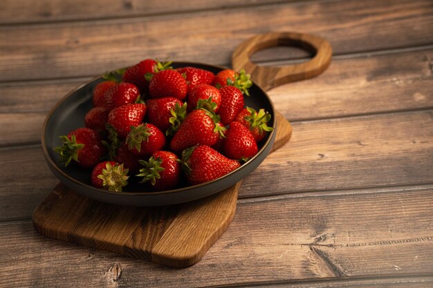 Foto fragola sulla tavola di legno