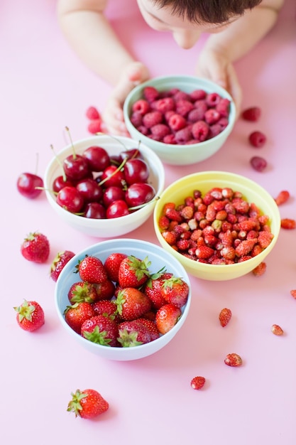 Strawberrycherryraspberry berries in bowls