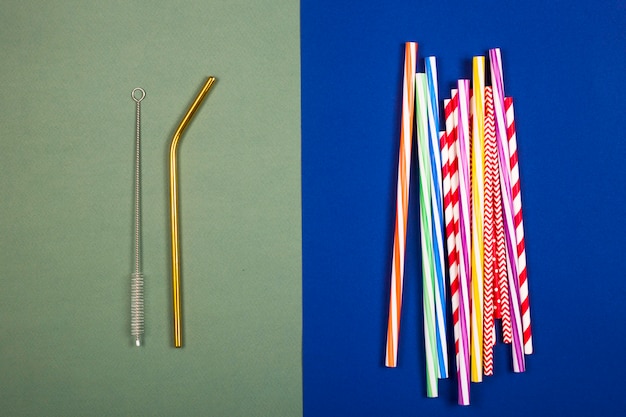 Straws for drinks - multi-plastic or one gold metal.