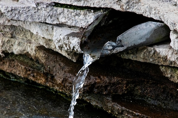 Stream of water in the spring on the stones