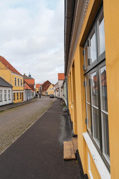 Street amidst buildings against sky