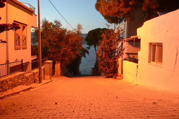 Street amidst buildings against sky