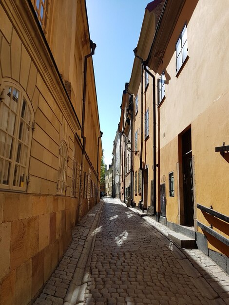 Street amidst buildings against sky