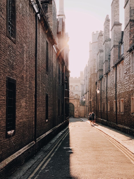 Street amidst buildings in city against sky