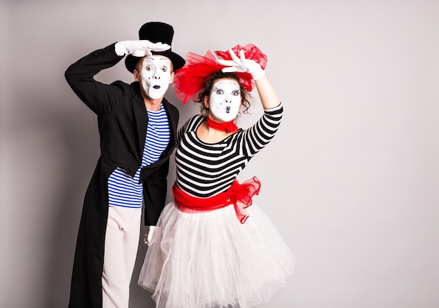 Street artists performing, Two mimes man and woman in april fools day.