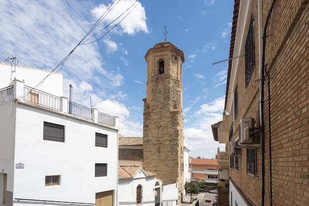 street and bell tower of the church of Montejicar