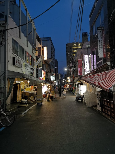 Street and buildings against sky