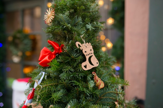 Street Christmas tree decoration near the restaurant. Lviv, Ukraine