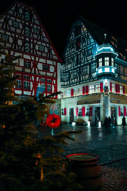 Street decorated for New Year and Christmas Market in Rothenburg ob der Tauber Bavaria Germany December 22 2022