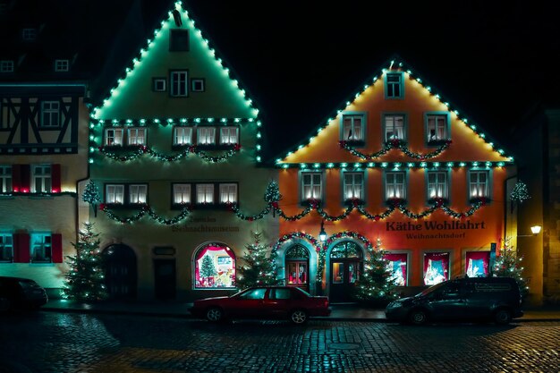 Street decorated for New Year and Christmas Market in Rothenburg ob der Tauber Bavaria Germany December 22 2022