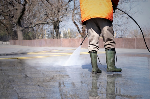 Photo street disinfection, preventive quarantine measures.empty streets. road washing.