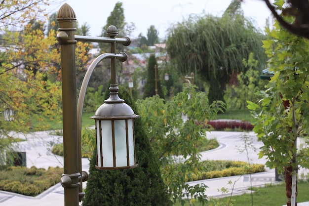 Street lamp on the background of the blue dome of the mosque