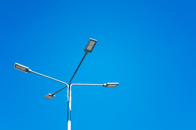 Photo street lamp with reflectors against the sky. energy saving technologies.