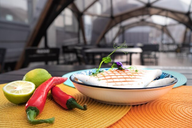 Street mexican food closeup microgreens pepper and lime on the table high quality photo