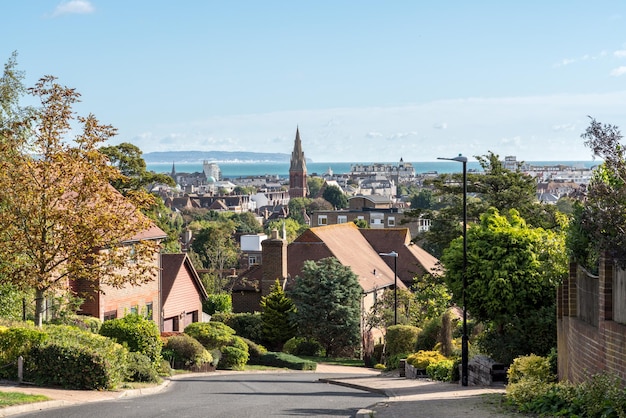 Street of modern English detached homes